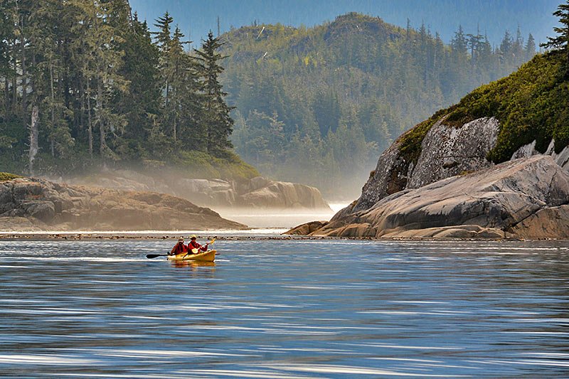 Kayakers on a vacation of a lifetime: Orca Dreams offers kayaking, whale watching and luxury camping on Compton Island, Blackney Pass, British Columbia