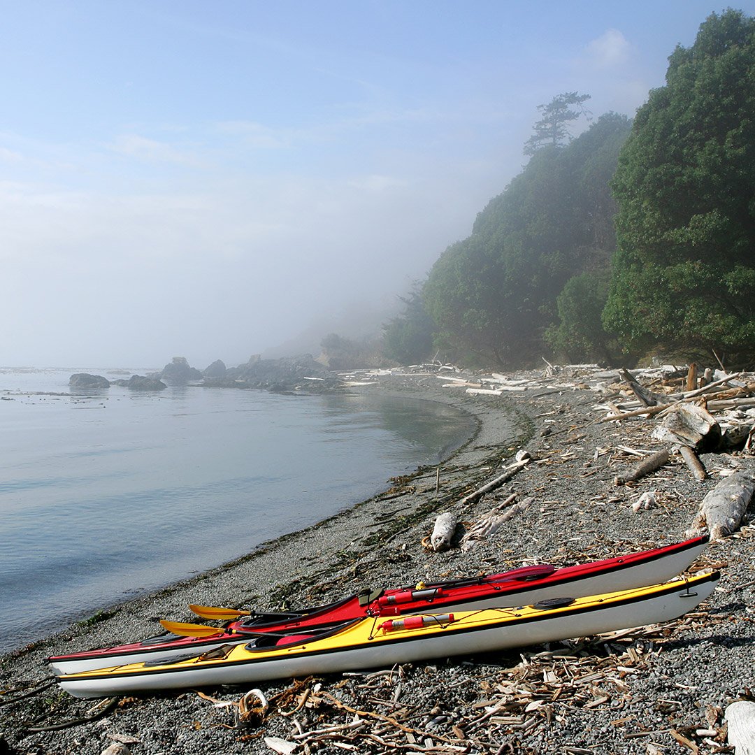 sea kayaks on remote beach vancouver island british columbia 4890469 - British Columbia