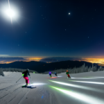 Night skiing with city lights at Grouse Mountain