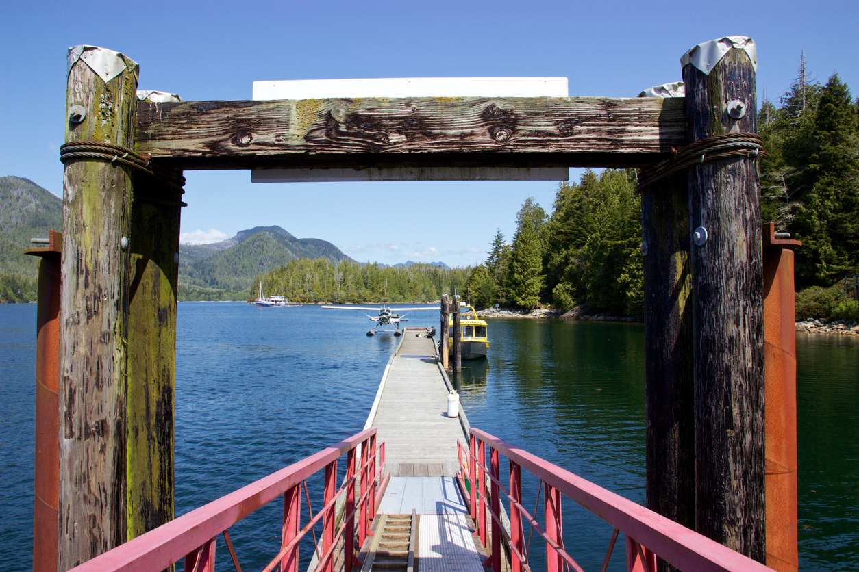 Seaplane and boat docked at Hot Springs Cove, Tofino