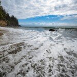 High Angle shot of the ocean waves. Mystic Beach, Juan de Fuca Trail, Vancouver Island, BC