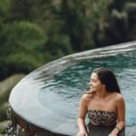 woman-swimming-pool-jungle-view