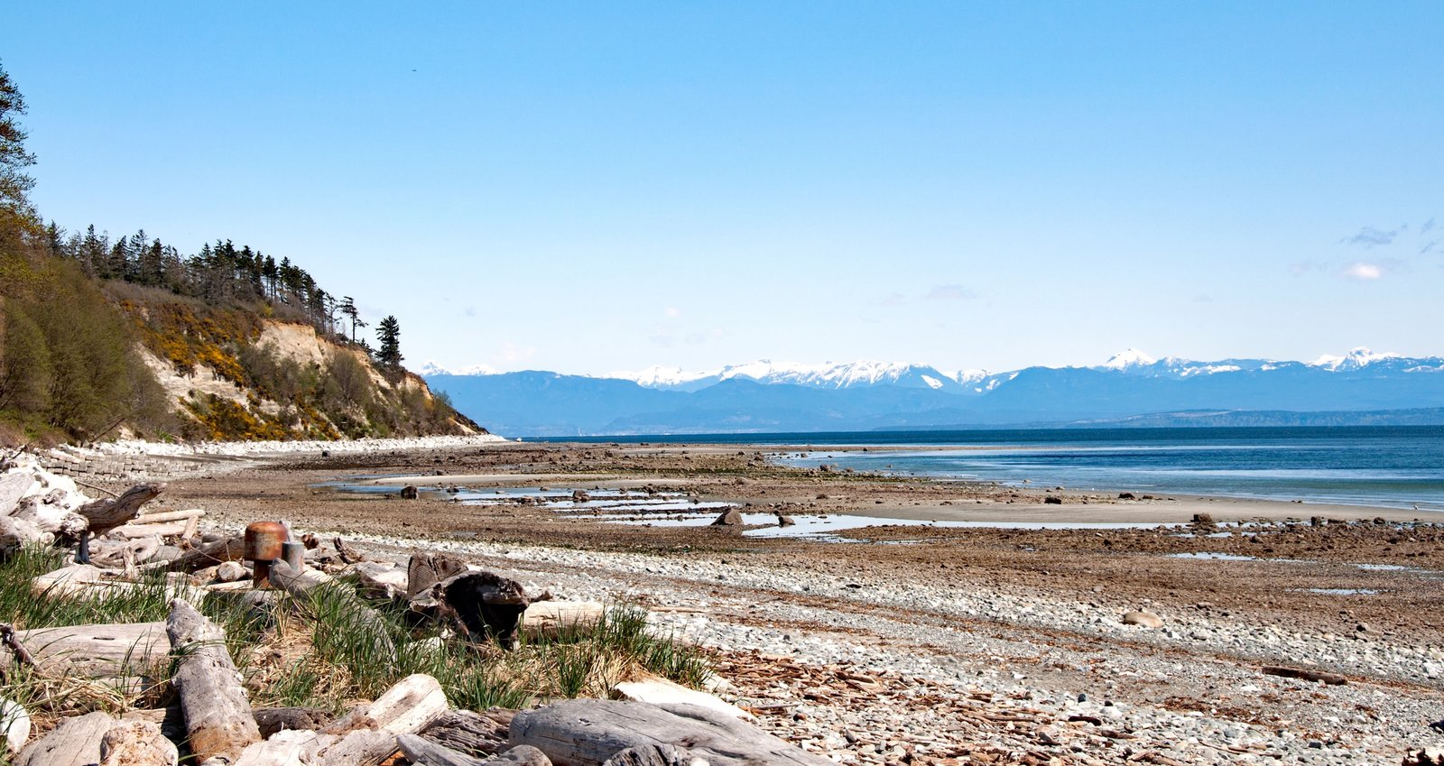 View of Qualicum Beach with Mountains in the background.