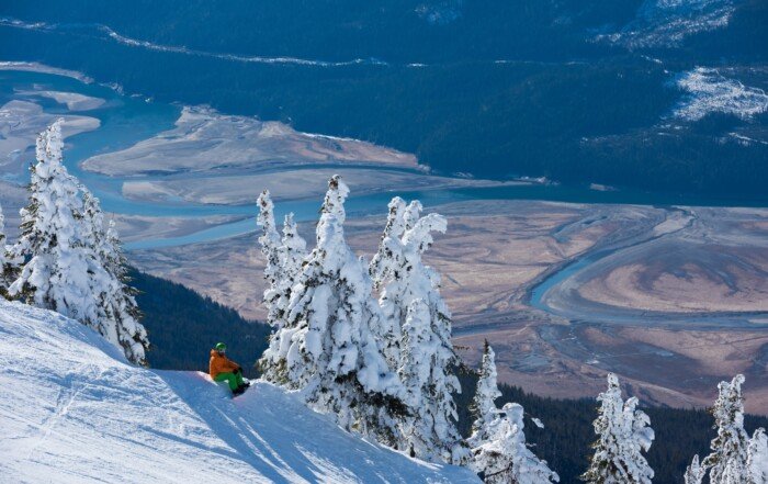 A snowboarder on the slopes at Revelstoke Mountain Resort.