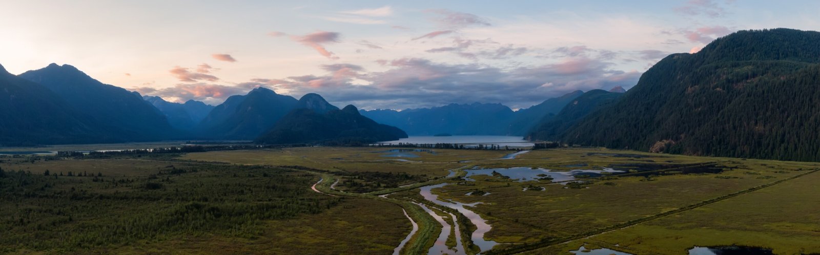 Beautiful aerial panoramic view of mountain landscape near Pitt Lake, British Columbia.