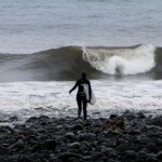 Surfing the Jordan River on the west coast of Vancouver Island.