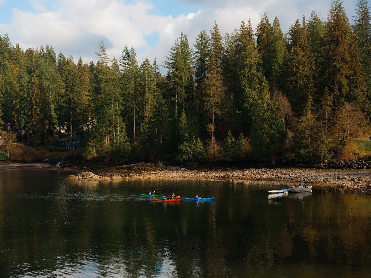 Group kayaking Quadra Island BC exploring calm bays