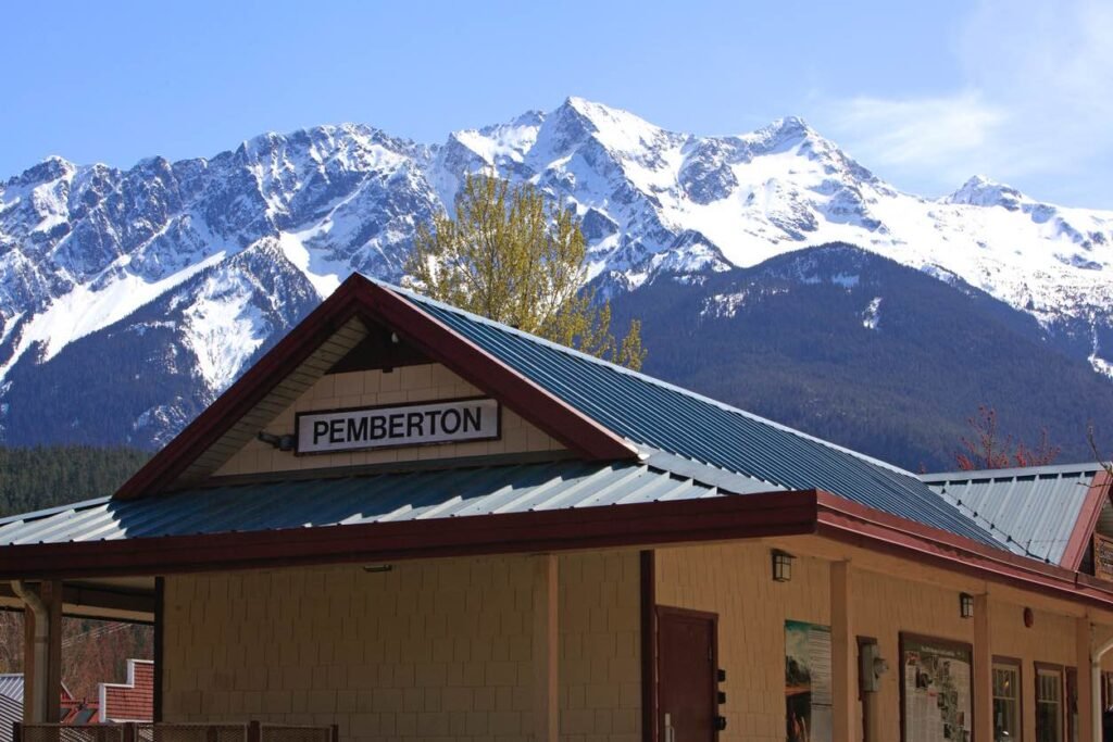 Snow-covered mountains and evergreen forests surrounding the quaint village of Pemberton during a winter road trip along British Columbia’s Sea-to-Sky Highway.