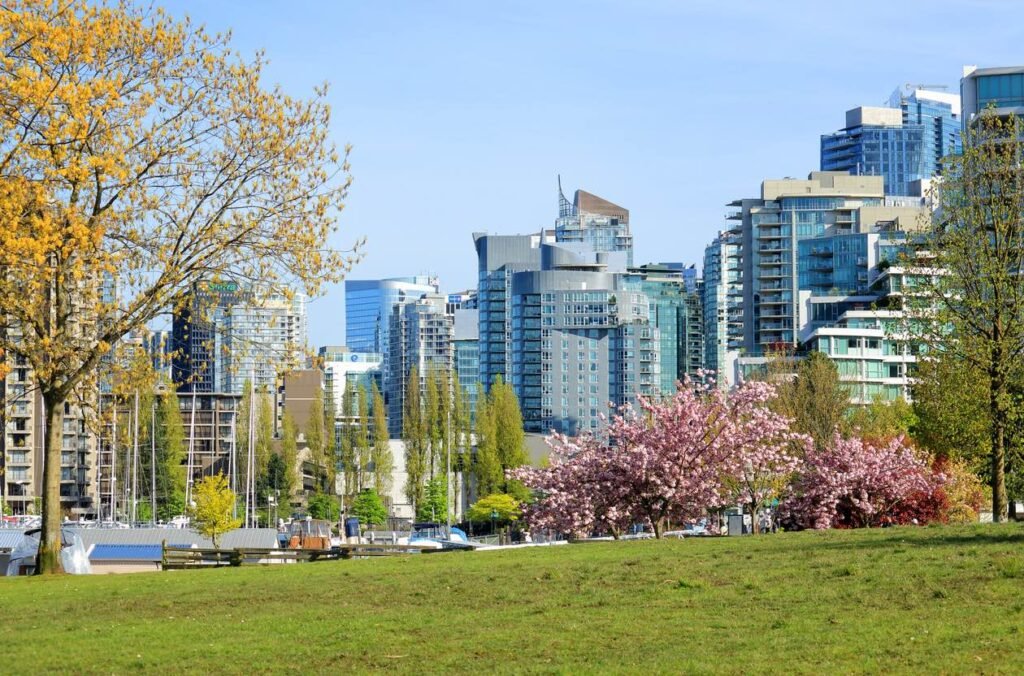 British Columbia shoulder season in Vancouver – cherry blossoms and city skyline in spring